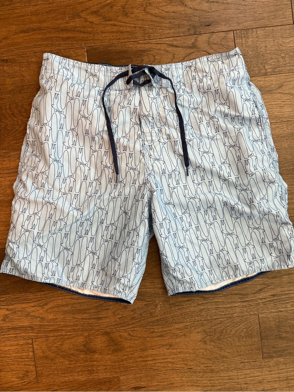 johnnie-O White Swim Trunks with Navy surfer and surf board Silhouette Print